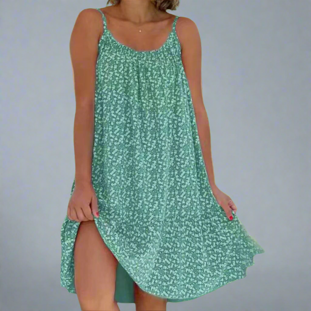 Colorful floral print women's mini dress. A stylish camisole summer dress for elegant casual or party looks.