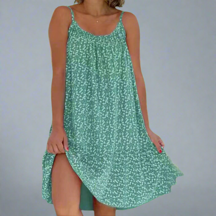 Colorful floral print women's mini dress. A stylish camisole summer dress for elegant casual or party looks.