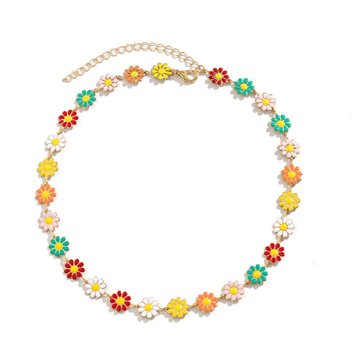Vibrant women's floral charm bracelet showcasing colorful daisy flowers, a stylish addition to any outfit.