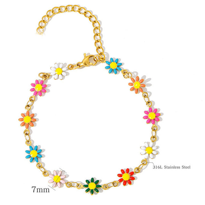 Women's floral daisy charm bracelet gracefully adorning a wrist, perfect dainty jewelry for any occasion.