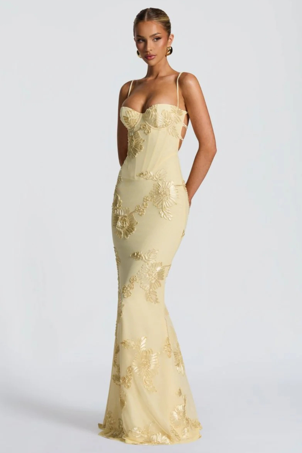 Elegant floral embroidered corset maxi dress with cami straps, perfect for wedding guests.