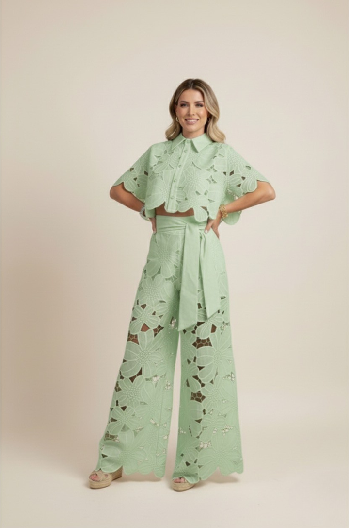 Matching women's floral embroidered button-up top and wide-leg pant set, ideal for summer fashion.