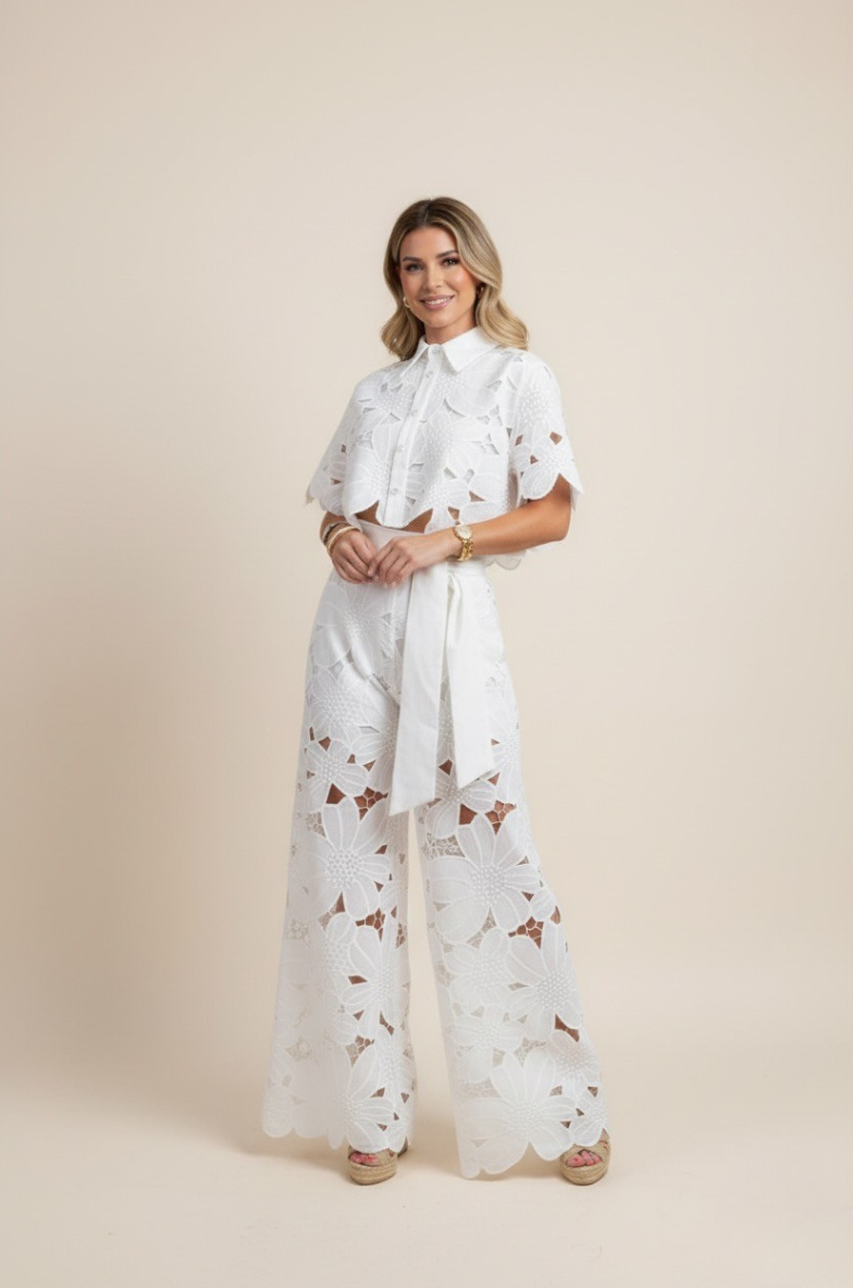 Elegant women's matching set featuring a button-up top and wide-leg floral embroidered pants.