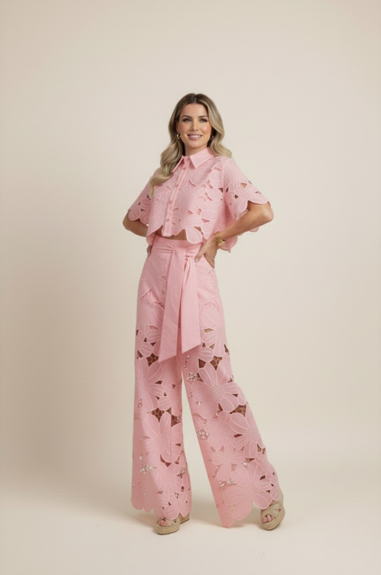 Fashionable women's floral embroidered wide-leg outfit, a stylish summer ensemble for resort.