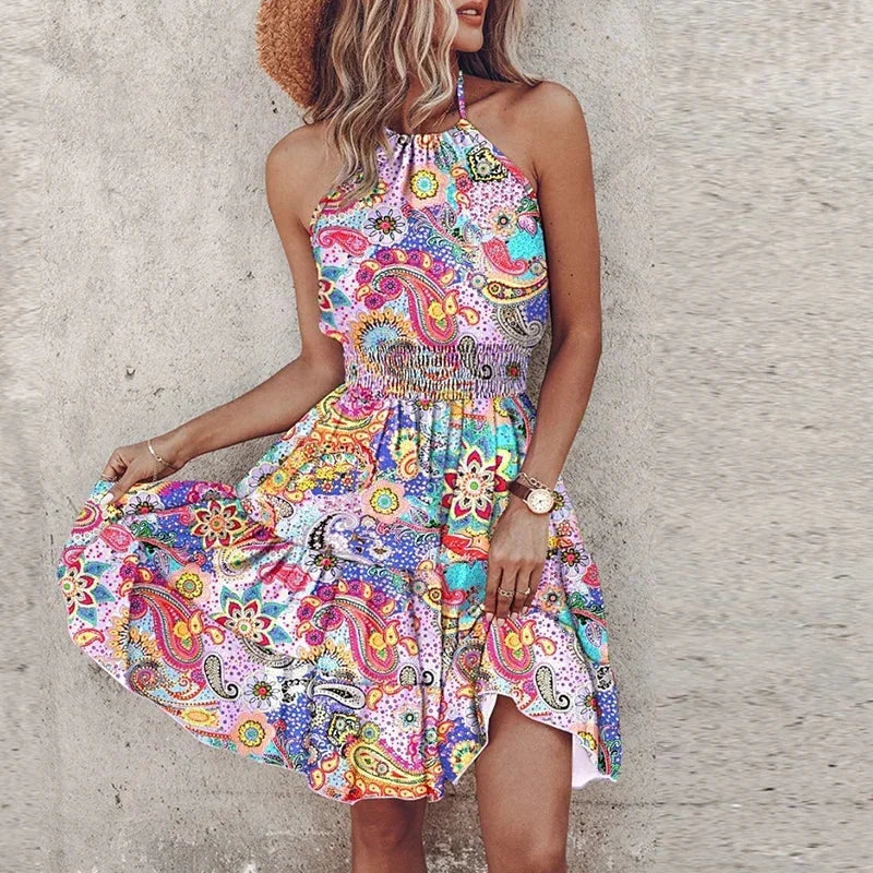 A-line women's mini dress, vibrant floral print, halter neck, smocked waist. Stylish summer fashion.