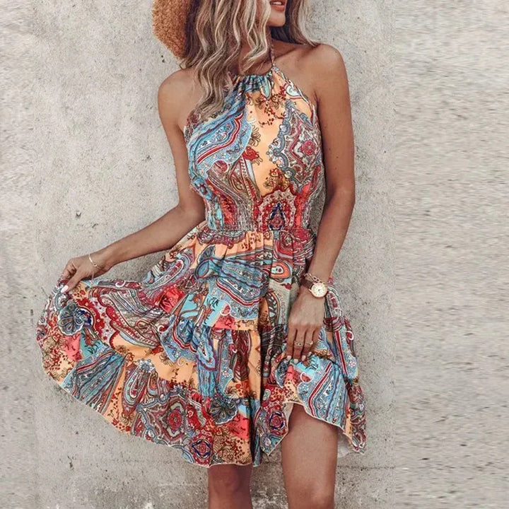 Lightweight sleeveless floral mini dress for women, halter neck, smocked waist, flowy design.