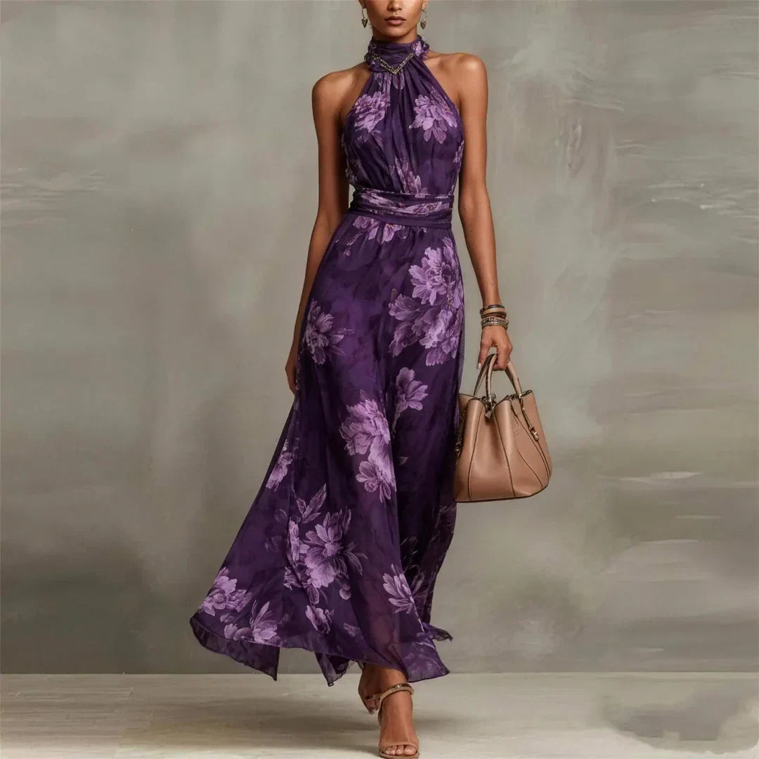 Flowy women's floral maxi dress with a halter neck, comfortable and stylish for any summer event.