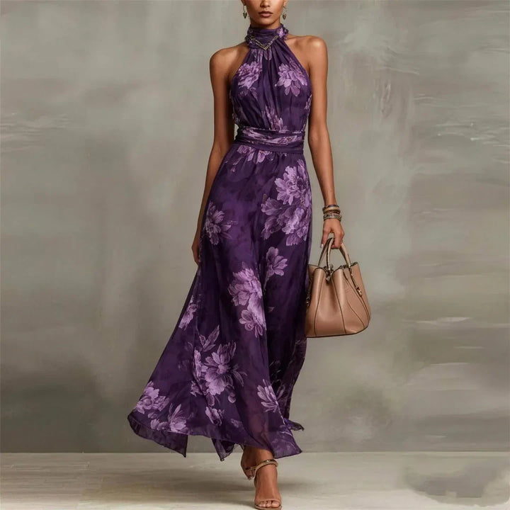 Flowy women's floral maxi dress with a halter neck, comfortable and stylish for any summer event.