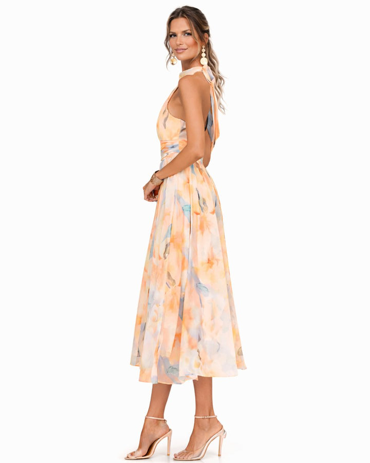 Feminine women's floral midi dress with a chic halter neckline and elegant watercolor design for summer events.
