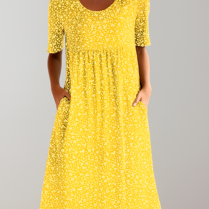 Comfortable floral high-waist midi dress for women, A-line cut with pockets, perfect for relaxed summer days.