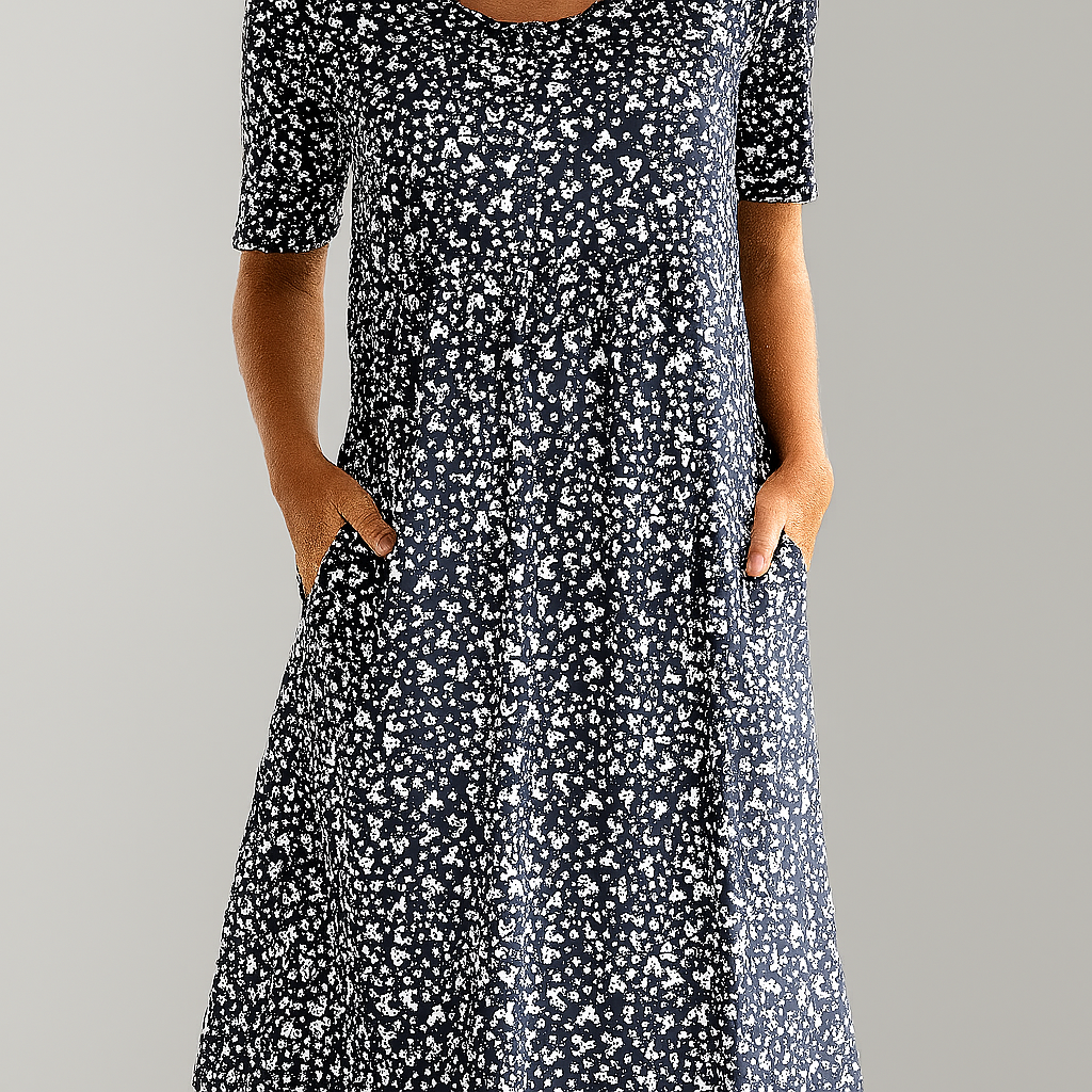 Women's summer floral midi dress, high-waist empire cut with practical pockets. Stylish and comfortable.