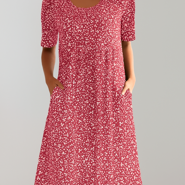 Casual women's floral high-waist midi dress, comfortable A-line design with pockets. Perfect for summer outings.