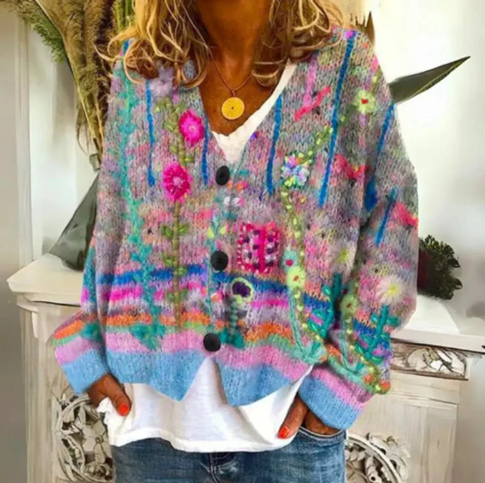 Women's floral knit button-up cardigan with V-neck, long sleeves, and vibrant embroidered details, perfect for casual style.