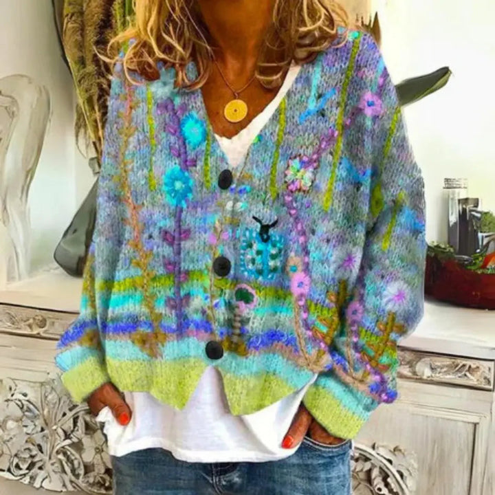 Embroidered floral button-up cardigan for women with a V-neck, long sleeves, and practical pocket details, for bohemian fashion.