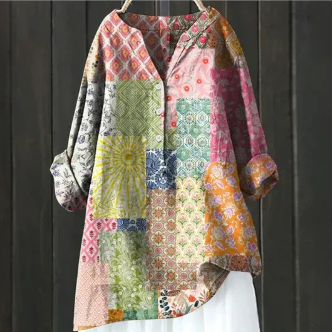 Elegant women's printed floral blouse with long sleeves and a V-neck, offering a comfortable, airy feel.