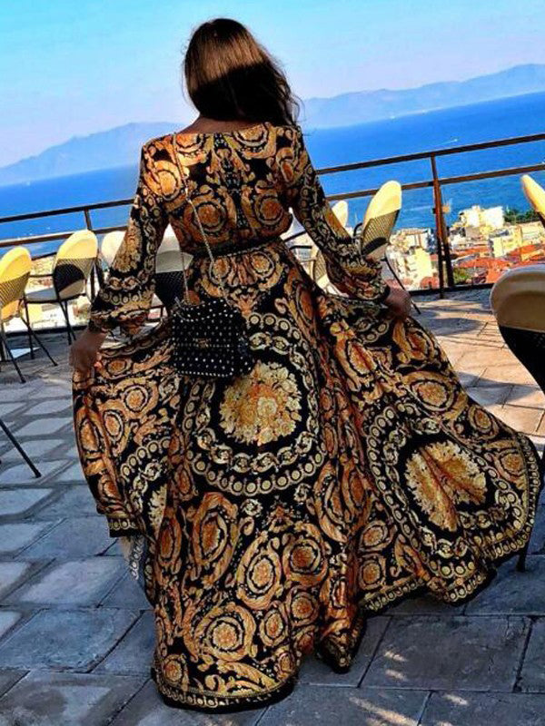 Vintage-style floral print long sleeve maxi dress, ideal for bohemian chic & spring fashion.