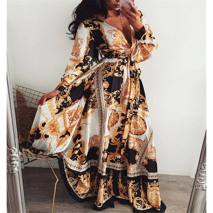 Women's bohemian long sleeve maxi dress featuring vibrant floral print, perfect for elegant wear.