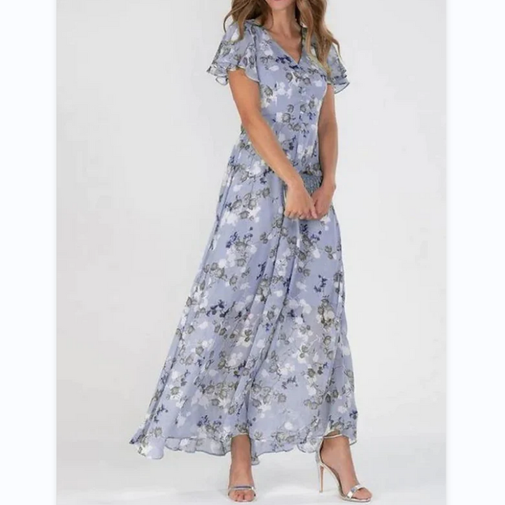 Long floral summer dress with graceful butterfly sleeves, a casual chic women's party or vacation outfit.