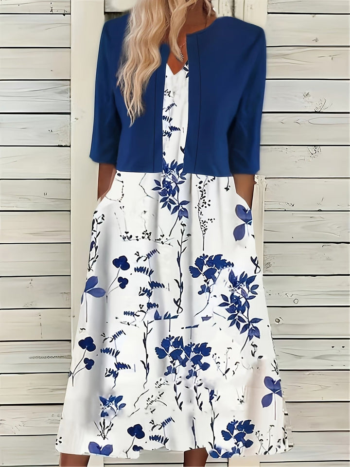 Stylish women's summer floral midi dress set with a lightweight shrug. Casual elegant outfit perfect for warm weather.