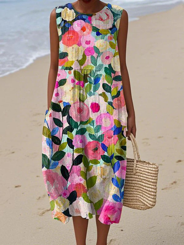 Women's floral midi dress, sleeveless, featuring a vibrant multicolor print. Ideal for comfortable, elegant summer style.