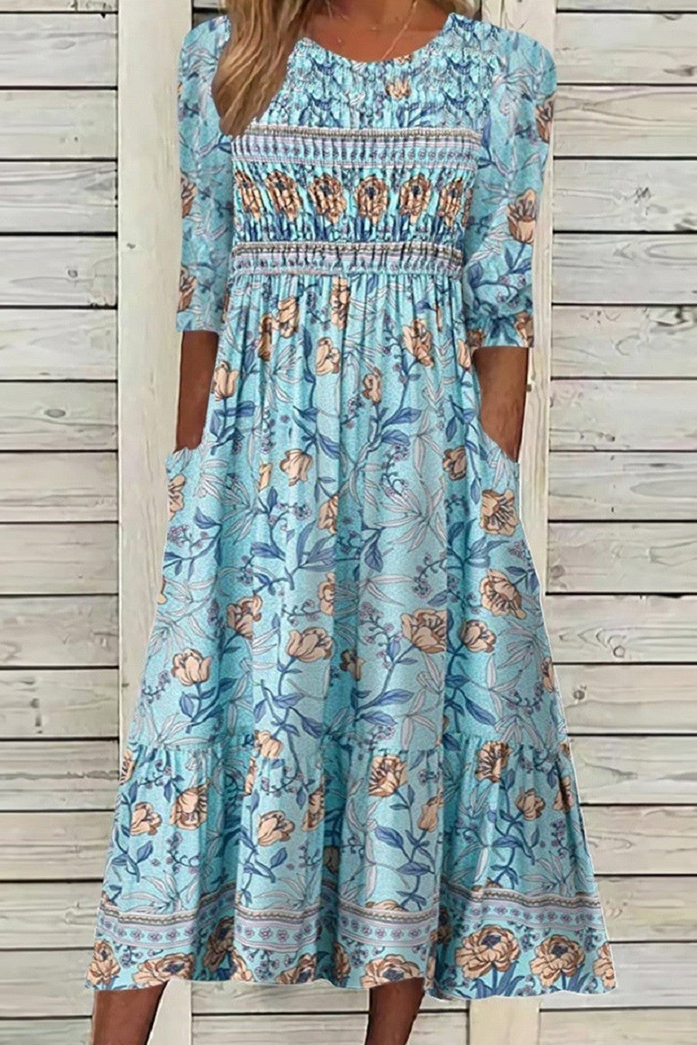 Women's floral midi dress with relaxed fit, perfect for spring, summer, and casual vacation wear.