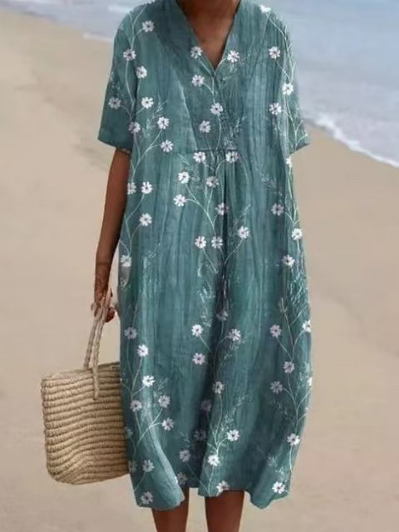 Charming floral print midi dress for women, short sleeve, relaxed fit, a stylish summer casual dress.