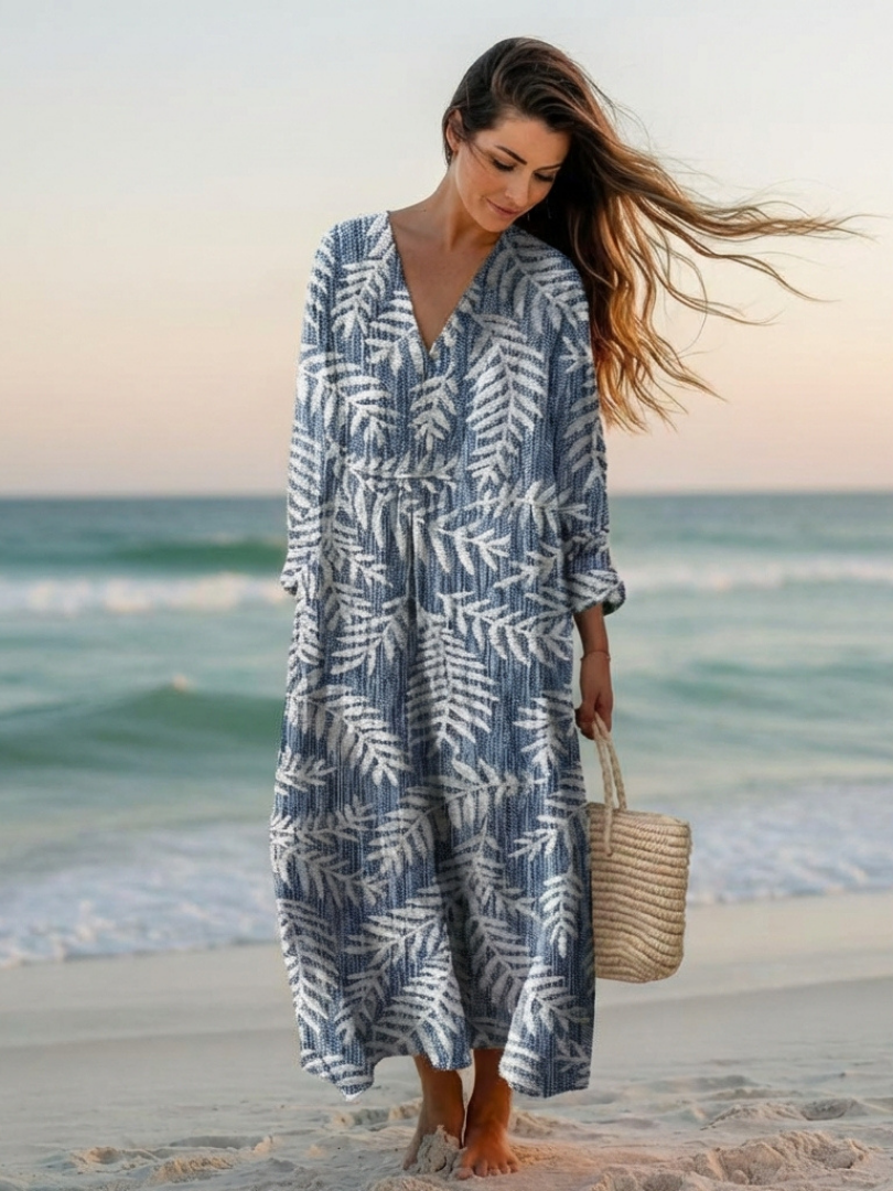 Beautiful patterned floral midi dress for women, short sleeve, relaxed fit, versatile summer style.
