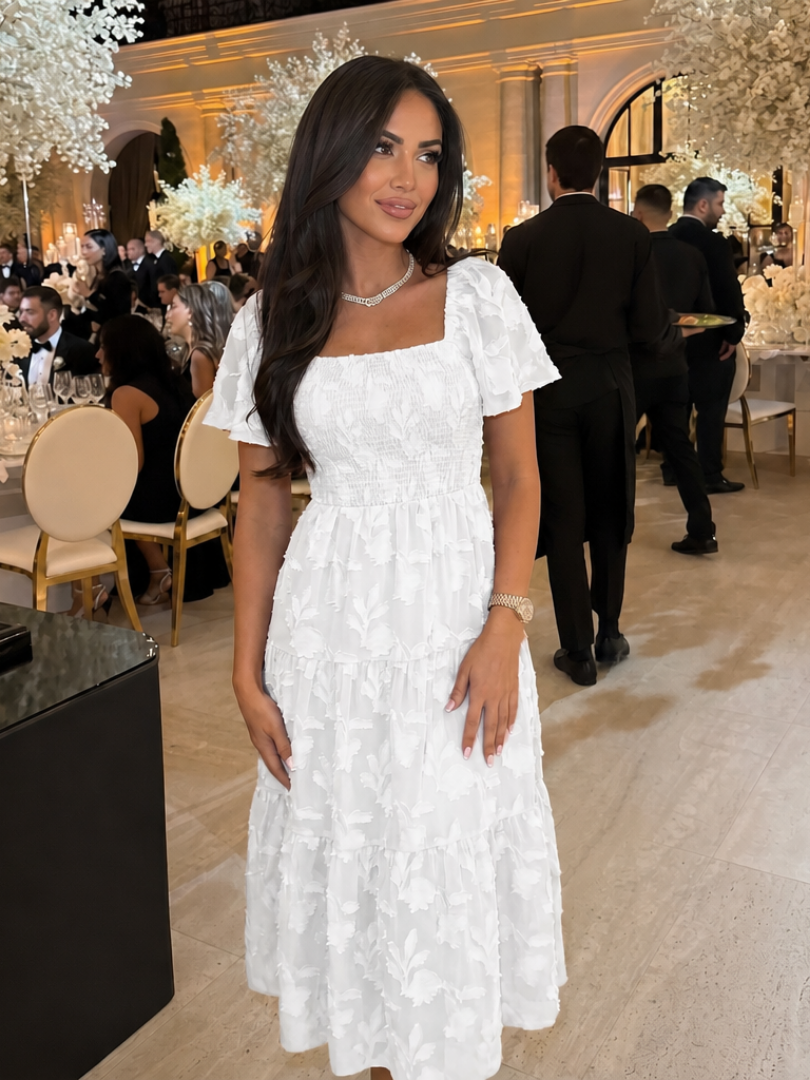 Beautiful women's floral print midi dress, short sleeves, tiered design for chic style.