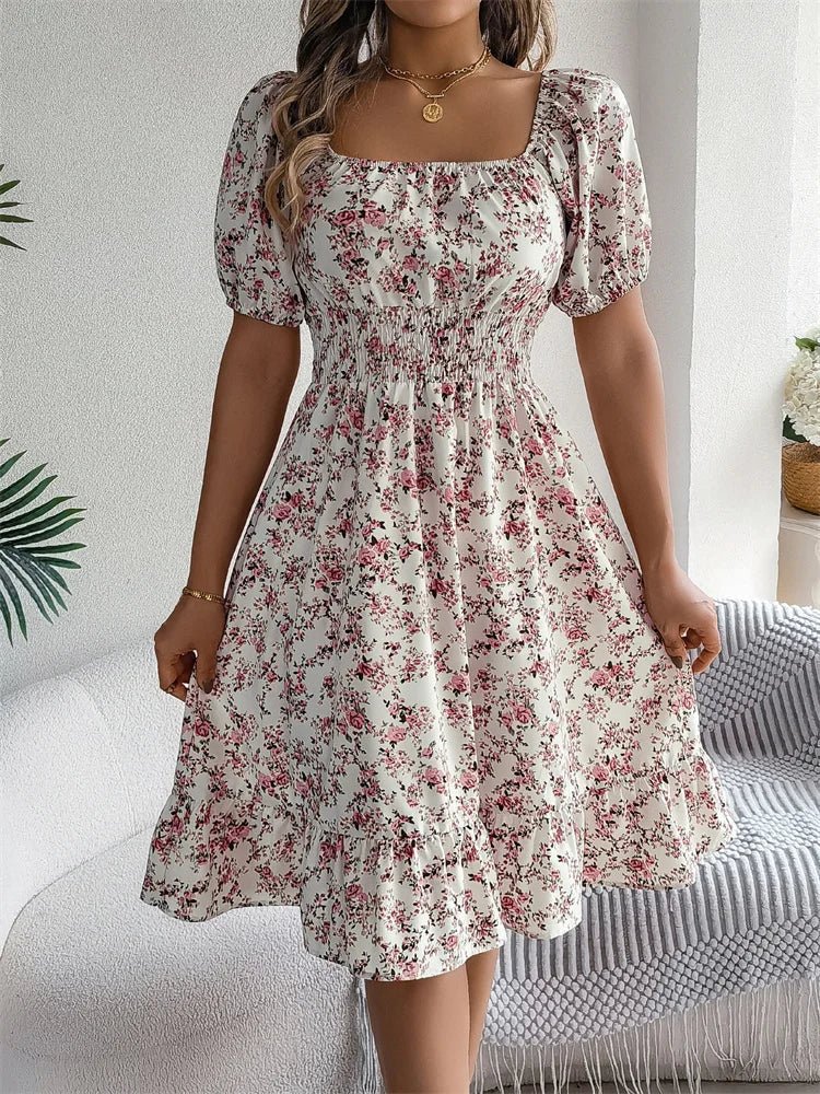 Beautiful women's floral midi dress with a smocked square neck & elegant puff sleeves.