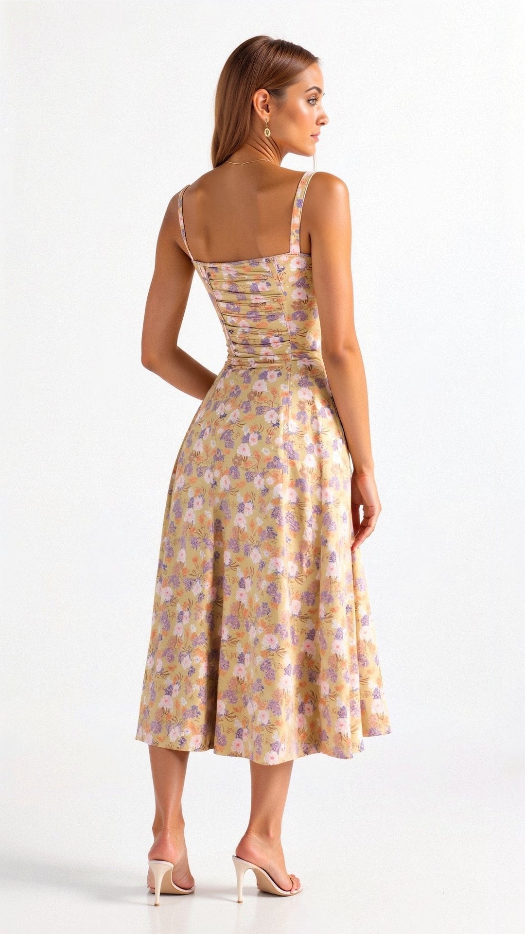 Feminine floral corset midi dress featuring a sweetheart neckline, ideal for summer garden parties.