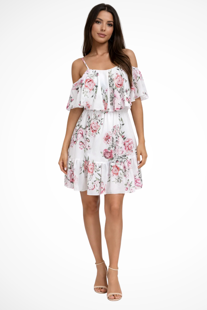 Women's tiered floral off-shoulder mini dress. Features delicate ruffles, perfect for a bohemian summer look.