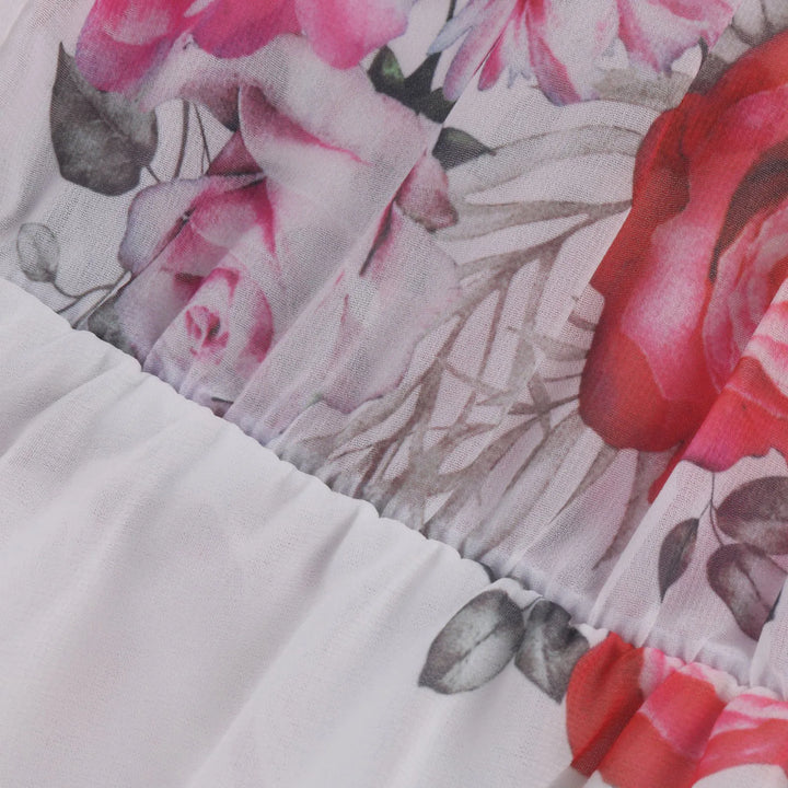 Stylish women's floral off-shoulder mini dress with ruffles. A chic boho summer party or vacation outfit.