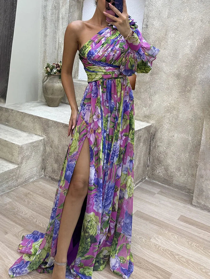 Long women's floral dress, one-shoulder design, and a fashionable high slit.
