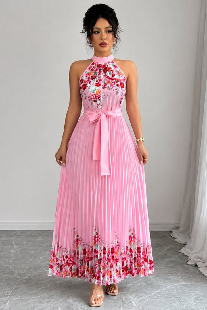 Women's floral pleated halter-neck maxi evening gown.