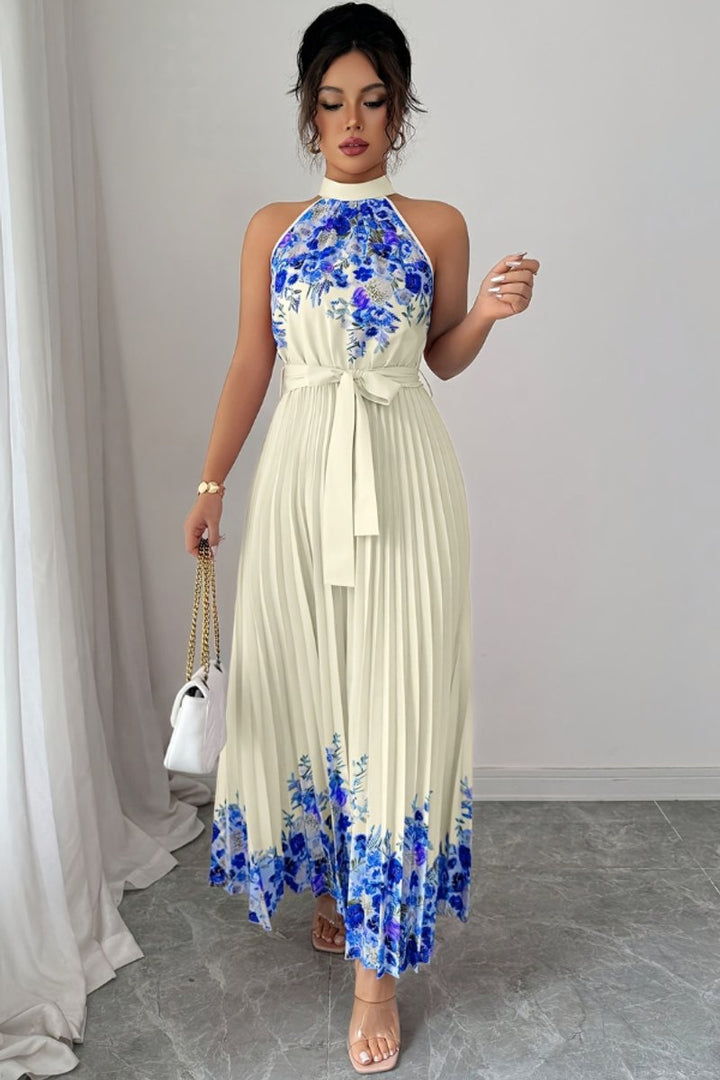 Elegant women's floral pleated evening gown with a halter neckline.