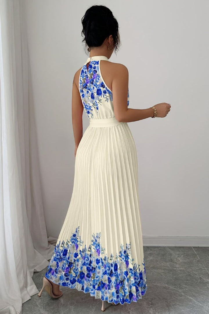Floral print halter-neck maxi dress, ideal for summer weddings.