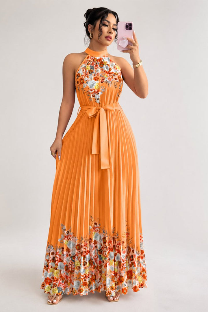 Women's floral halter neck dress, pleated, long, for elegant occasions.
