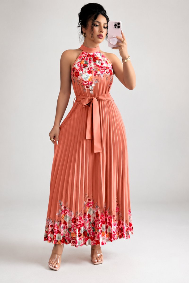 Garden party floral maxi gown, pleated and styled with a halter neck.