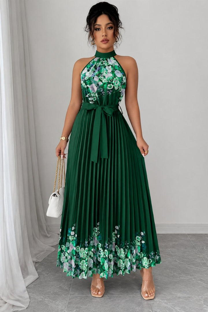 Special occasion floral print maxi gown, pleated, with a halter neckline.