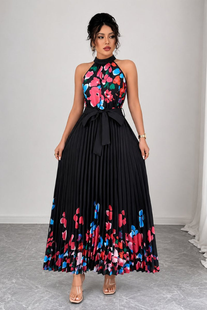 Beautiful floral pleated maxi dress with a chic halter neck for women.