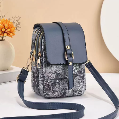 Women's floral print crossbody bag, elegant faux leather shoulder purse, versatile for daily use.