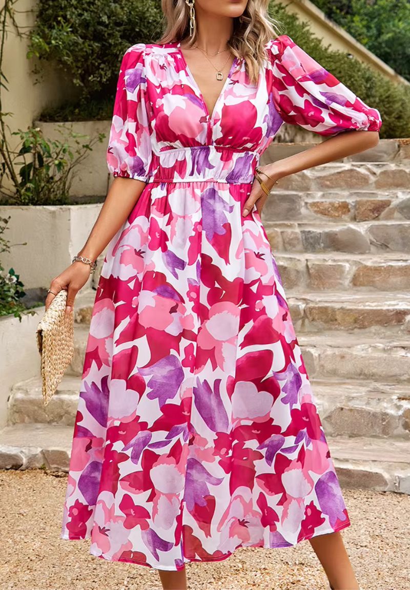 Feminine women's floral print long dress with V-neck, puff sleeves & summer vacation vibes.
