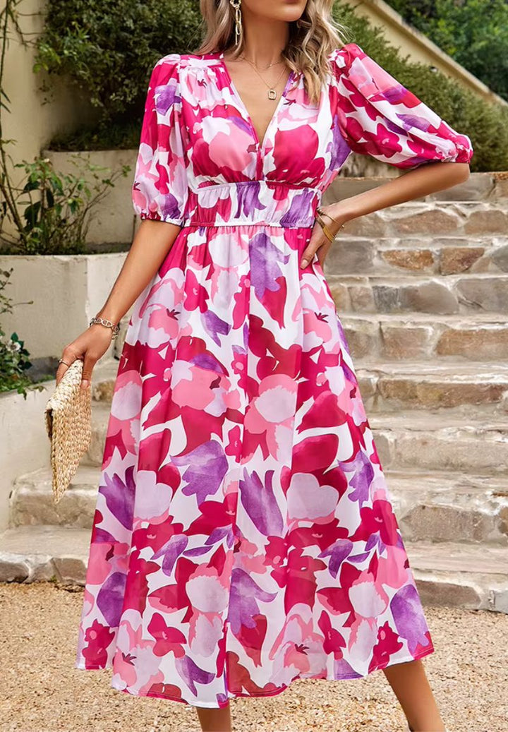 Feminine women's floral print long dress with V-neck, puff sleeves & summer vacation vibes.