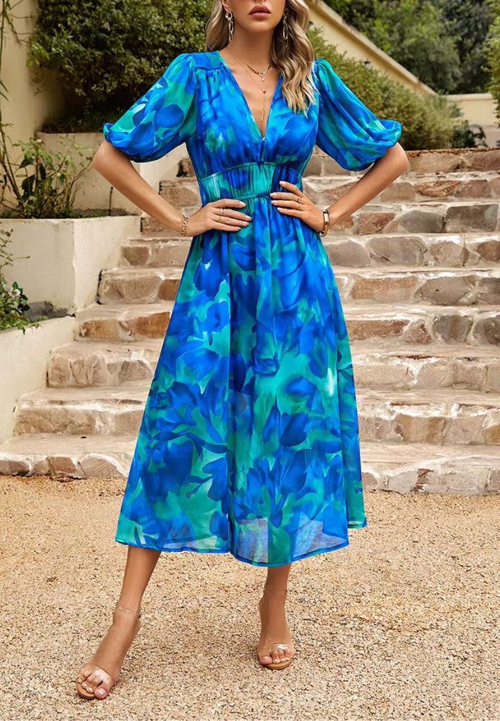 Beautiful women's floral print maxi dress with puff sleeves, V-neck & flowing silhouette.
