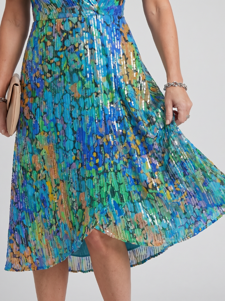 Women's day dress: floral print midi with flattering gathered waist, breezy flutter sleeves, and V-neck.