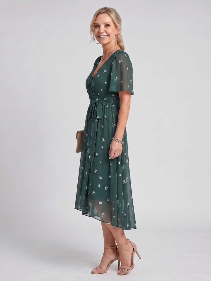 Elegant floral midi dress for women, featuring flutter sleeves, a gathered waist, and a chic V-neck.