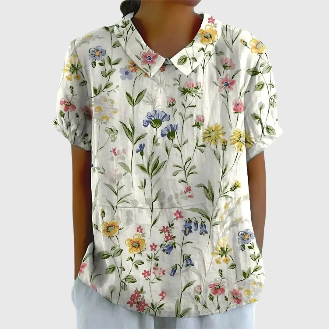 Women's floral print short sleeve collared blouse, perfect for smart casual spring & summer fashion.