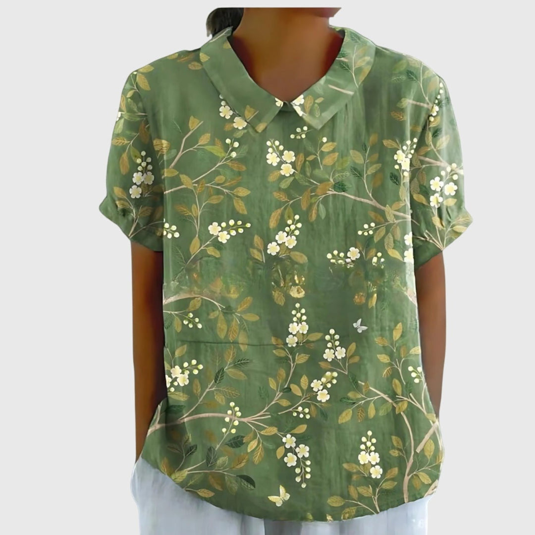 Breathable women's short sleeve floral blouse with collar, ideal for comfortable casual summer fashion.