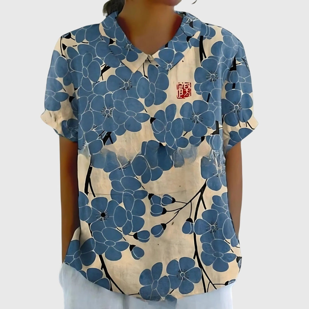 Women's spring floral print short sleeve blouse with a crisp collar, great for a polished casual look.