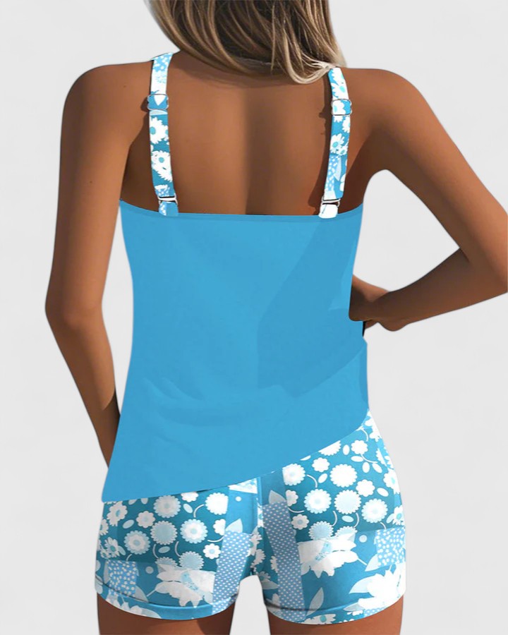 Modest women's floral print tankini swimsuit, ideal summer beachwear for stylish resort trips.